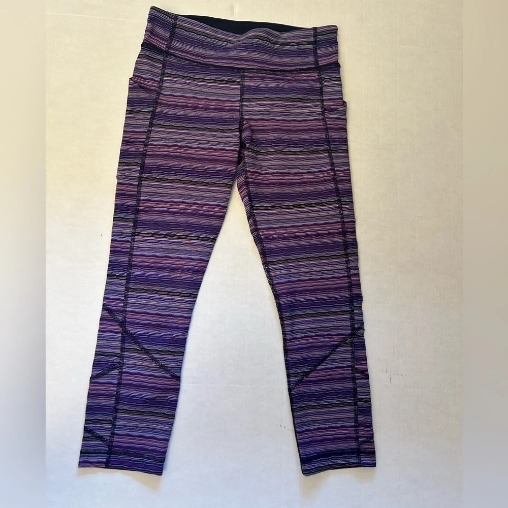 Lululemon striped purple legging w/back zip pocket & 2‎ side pockets Sz-6. Z19